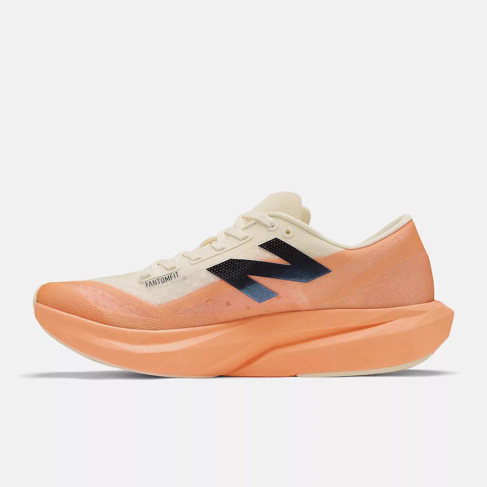 New Balance Men's Fuel Cell Rebel v4 - Hot Mango/Angora/Black